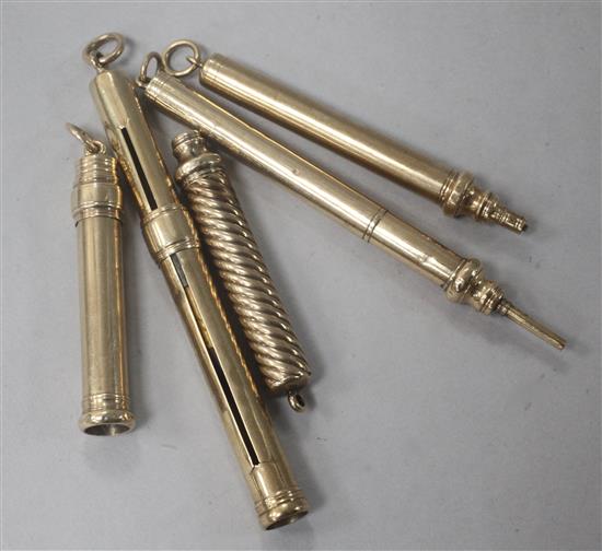 Five early 20th century 9ct gold overlaid propelling pencils including one with spiral case.